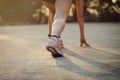 Woman runner begins running Royalty Free Stock Photo