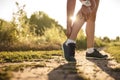 Woman runner hold her sports injured leg Royalty Free Stock Photo