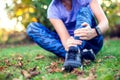 Woman runner hold her sports injured leg. Sport, medicine and pe Royalty Free Stock Photo