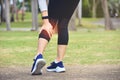 Woman runner hold her sports injured leg Royalty Free Stock Photo