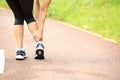 Woman runner holder her twisted ankle Royalty Free Stock Photo