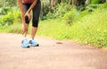 Woman runner holder her sports injured knee Royalty Free Stock Photo