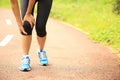 Woman runner injured knee