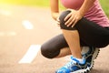Woman runner injured knee