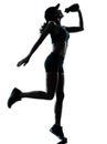 Woman runner jogger drinking silhouette Royalty Free Stock Photo