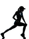 Woman runner jogger stretching warm up silhouette Royalty Free Stock Photo