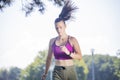 Woman runner running in park Royalty Free Stock Photo