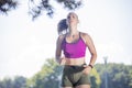 Woman runner running in park Royalty Free Stock Photo