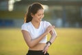 Woman runners apply sunscreen lotion Royalty Free Stock Photo