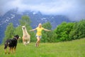 woman running with alpaca on Comino mount