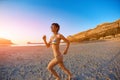 Woman running on the beach Royalty Free Stock Photo