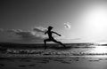 Woman running on the beach. Healthy woman run at sea, girl doing sport outdoor, happy female exercising, fitness and Royalty Free Stock Photo