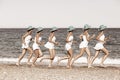 Woman running on a beach. Multiple exposure shot.