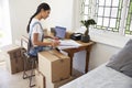 Woman Running Business From Home Working On Laptop Royalty Free Stock Photo