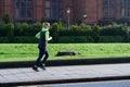 Glasgow, UK, March 17th 2024, Woman running in the countryside for health and wellbeing