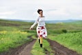 Woman running on a countryside road. Freedom concept Royalty Free Stock Photo