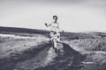 Woman running on a countryside road Royalty Free Stock Photo