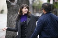 Woman Running Into a Friend on the Street By Coincidence