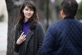 Woman Running Into a Friend on the Street By Coincidence