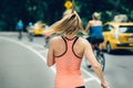Woman running on New York City Central Park at the morning. Royalty Free Stock Photo