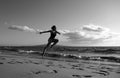 Woman Running Silhouette. Run On Sea. Sport Exercise At Beach Concept.