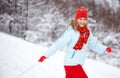 Woman running through snow