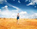 Woman Running Through Summer Harvested Field Royalty Free Stock Photo