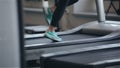 Woman running on the treadmill in the gym