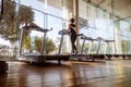 Woman running on treadmill in gym. Ealthy lifestyle