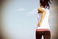 Woman running under blue sky Royalty Free Stock Photo