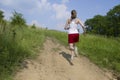 Woman running uphill