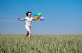 Woman running on the wheat field Royalty Free Stock Photo