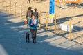 Woman runs along the Barcelona promenade in time of Covid 19 in winter 2021