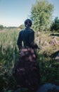 A woman runs along the swamp Royalty Free Stock Photo