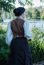 A woman runs along the swamp Royalty Free Stock Photo