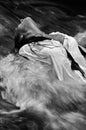 woman in rushing water Royalty Free Stock Photo