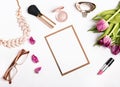 Woman`s accessories and pink tulips on white background Royalty Free Stock Photo