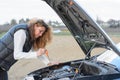 Woman's car breaks down Royalty Free Stock Photo