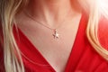 A woman`s cleavage with a star shaped necklace Royalty Free Stock Photo