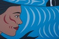 woman's face drawing on the wall blue background mermaid port canada place downtown vancouver canada 2023