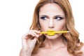 Woman's face with fashion yelow lips make-up Royalty Free Stock Photo