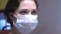 Woman`s face in respiratory mask look at somethig. Royalty Free Stock Photo