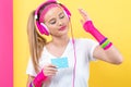 Woman in 1980`s fashion holding a cassette tape