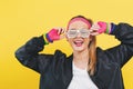 Woman in 1980`s fashion with shatter shade glasses Royalty Free Stock Photo