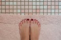 A Womans Feet on Bath Mat Royalty Free Stock Photo