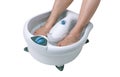 Woman's feet in a vibrating feet massager Royalty Free Stock Photo