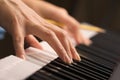 Woman's Fingers on Digital Piano Keys