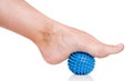 Woman's foot with massage ball Royalty Free Stock Photo