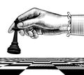 Woman`s hand with a black king chess piece