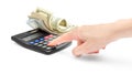 Woman`s hand counts on the calculator and money on white background